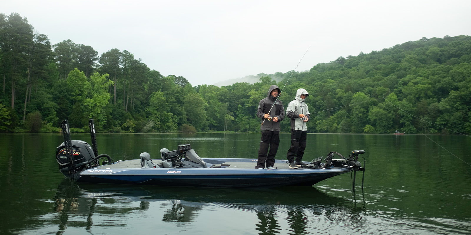 Image of a guy sporting FXR’s men’s black charcoal Vapor Pro Tri-laminate Jacket and Bib Pant system.