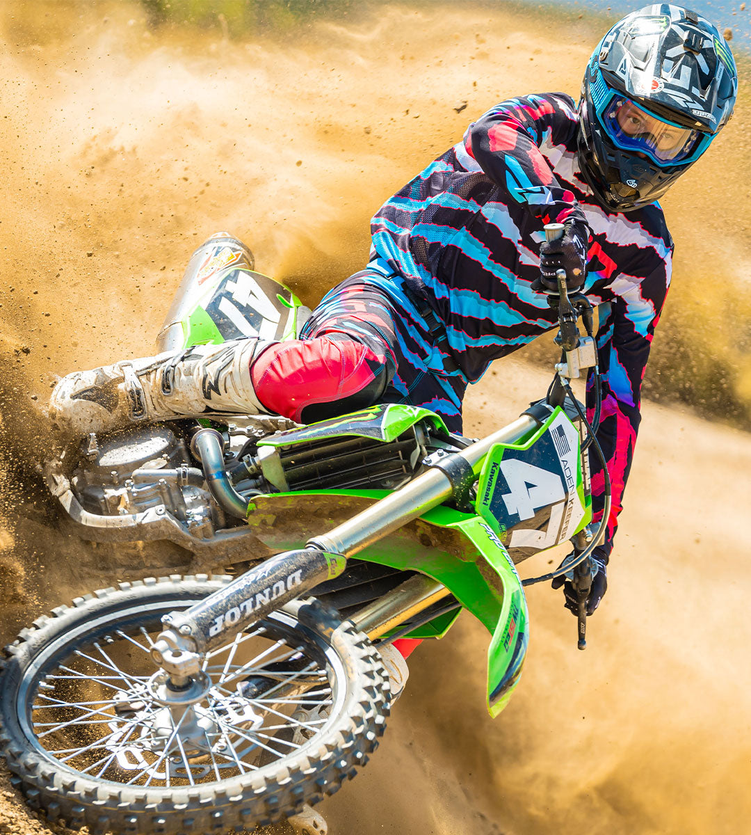 An image of a MX rider sporting the '24 Podium jersey and pant