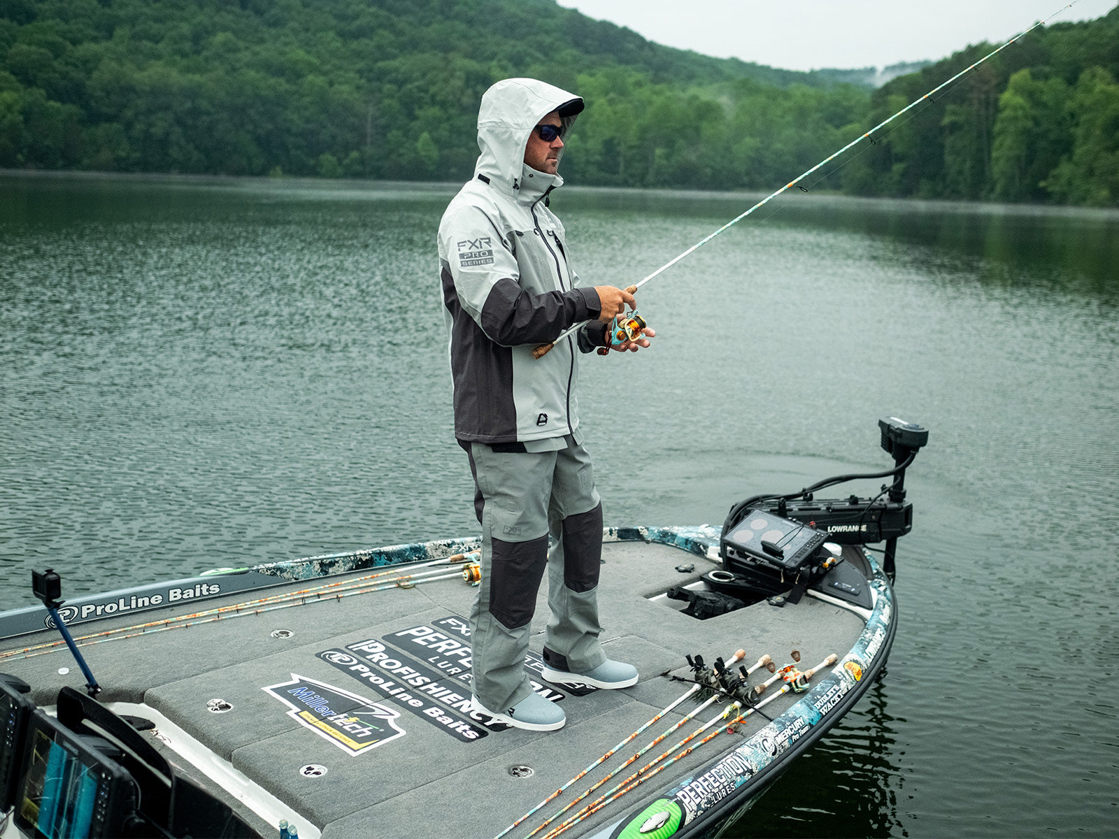 guy on a boat sporting the new FXR's Vapor Tri-laminate Jacket