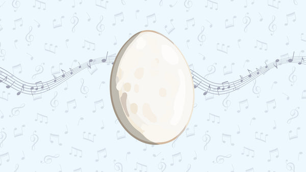 An incubating chick can sing in the egg! Egg image with musical notes.