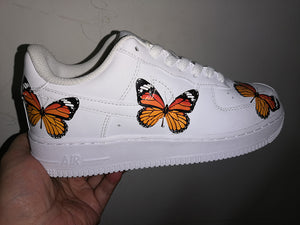 white vans with butterflies