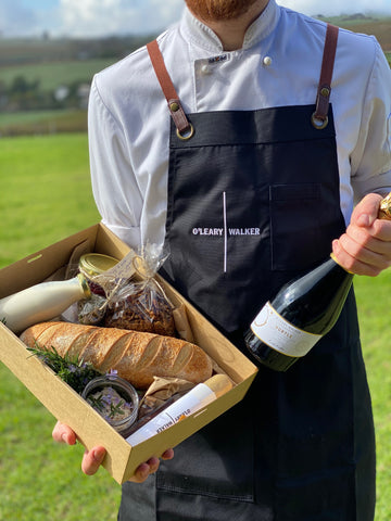 Mother's Day Bubbles and Brunch Pack held by a staff member.