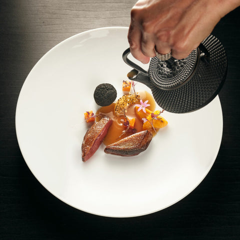 An image of a dish at L'Atelier Alexandre Bousquet.