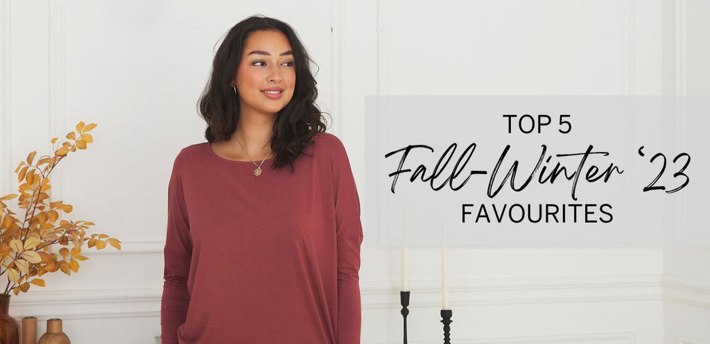 A woman wears a drapey bamboo top in Rosewood, a warm red-orange colour. Title text to the right reads, "Top 5 Fall-Winter '23 Favourites."