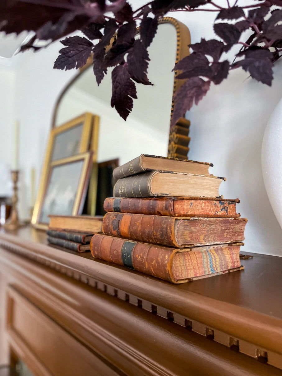 Base Layered Books with Decorative Object on Top