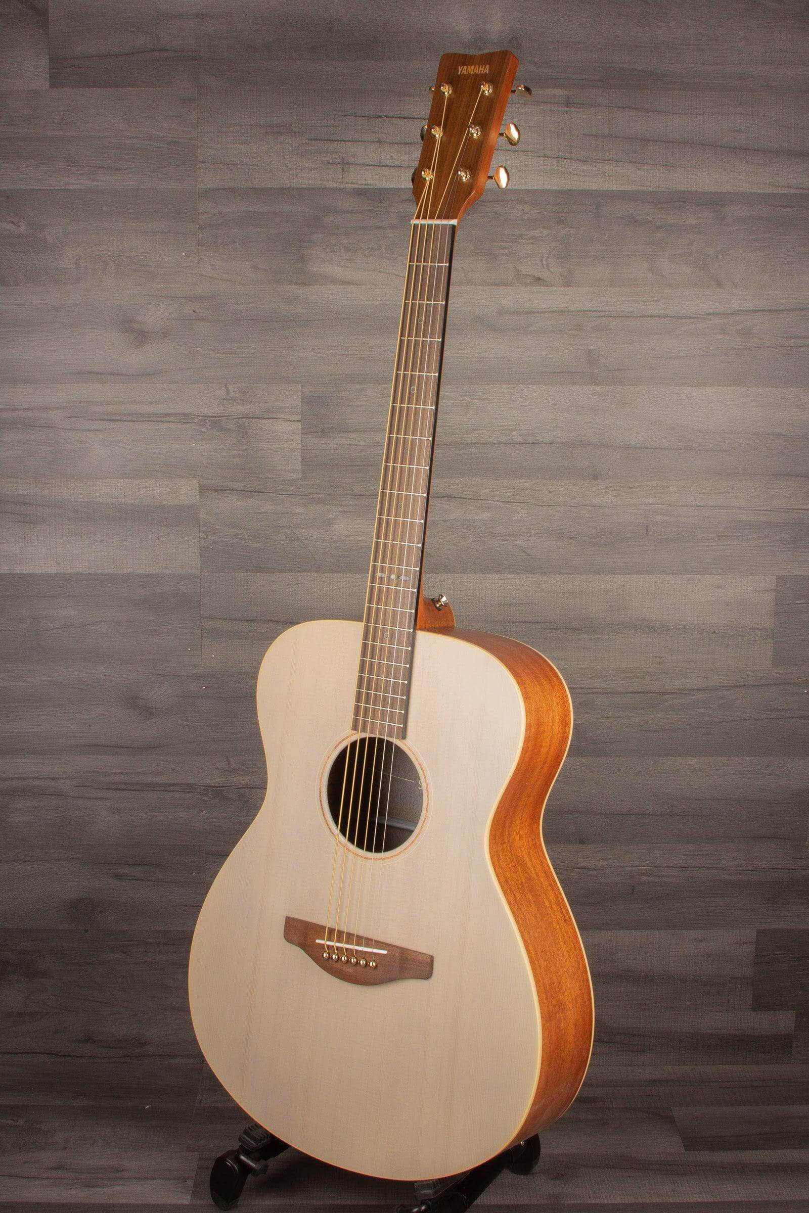 white acoustic guitar yamaha