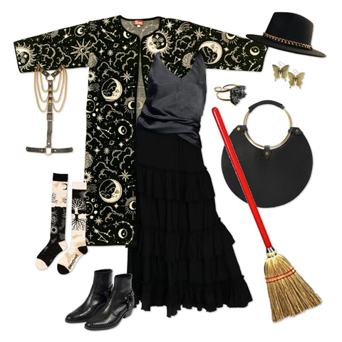 A collection of witchy garments assembled to show a styled look.