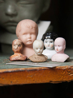 small porcelain doll heads