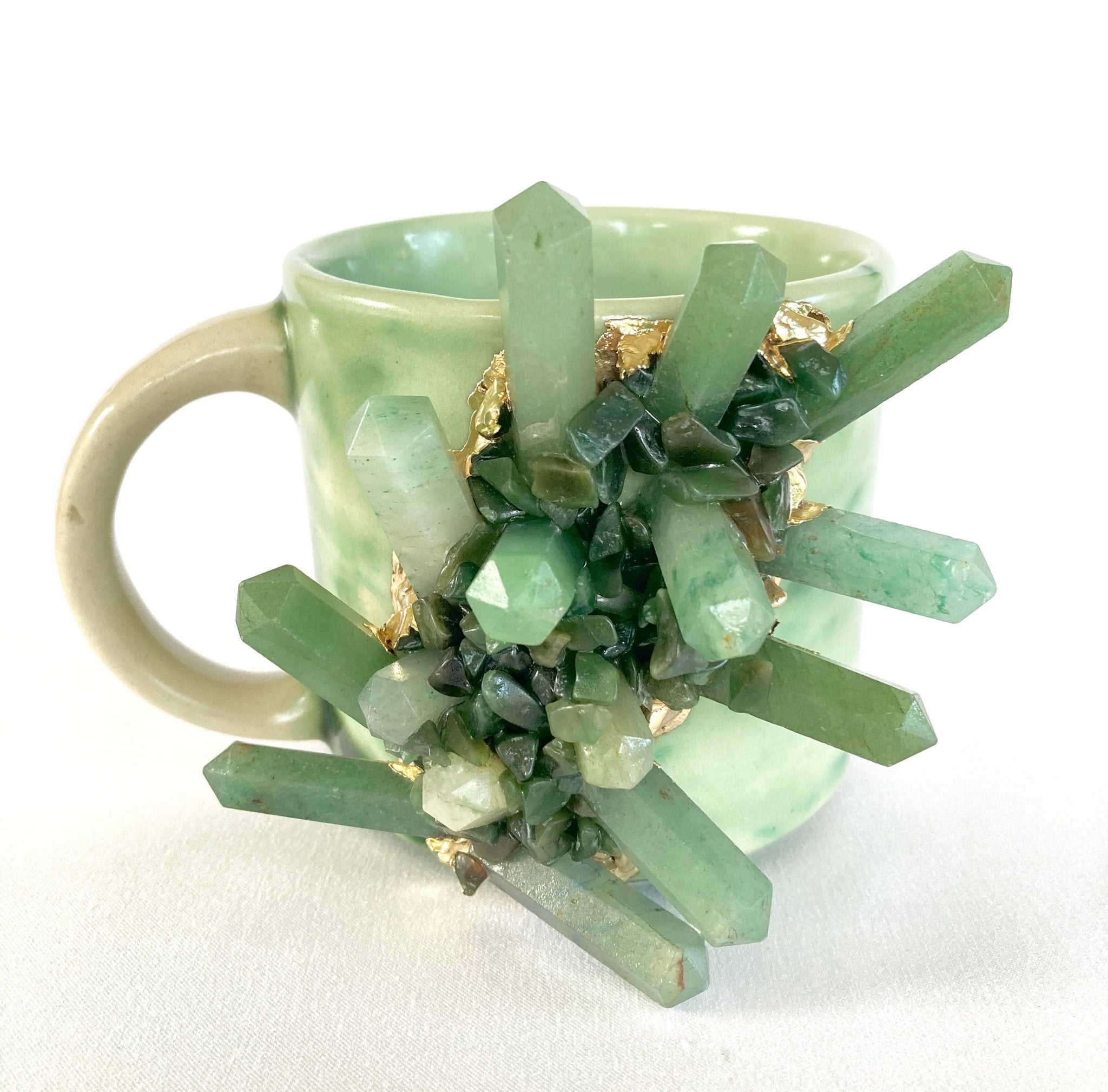 https://cdn.shopify.com/s/files/1/0244/3467/1721/products/green-marble-effect-ceramic-mug-green-agate-11oz-404378.jpg?v=1696980569