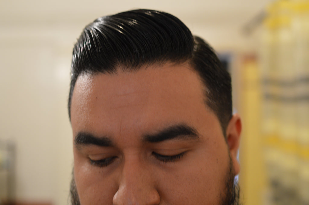 front shot of Miles Coltranes hair styled with Manshine Pomade
