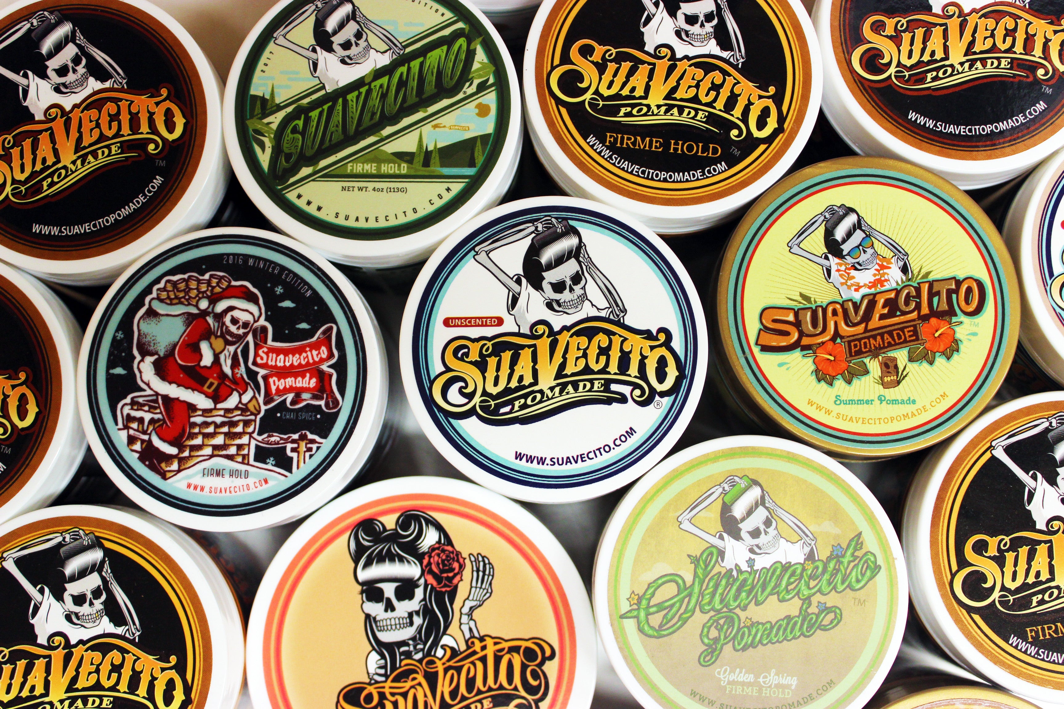 Various edition cans of suavecito pomade