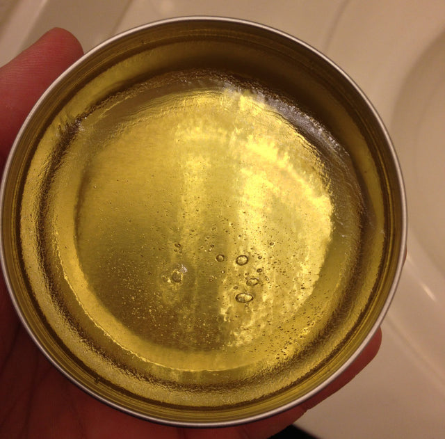 Grant's Golden Brand Pomade open can