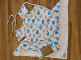 Odd Pod baby bib, made from 100% cotton flannel and backed with double-sided cotton towelling featured in a lovely blue and grey whale design.