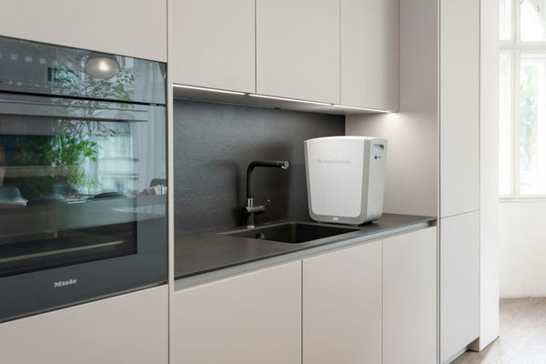 Modern kitchen featuring undersink reverse osmosis water filter system