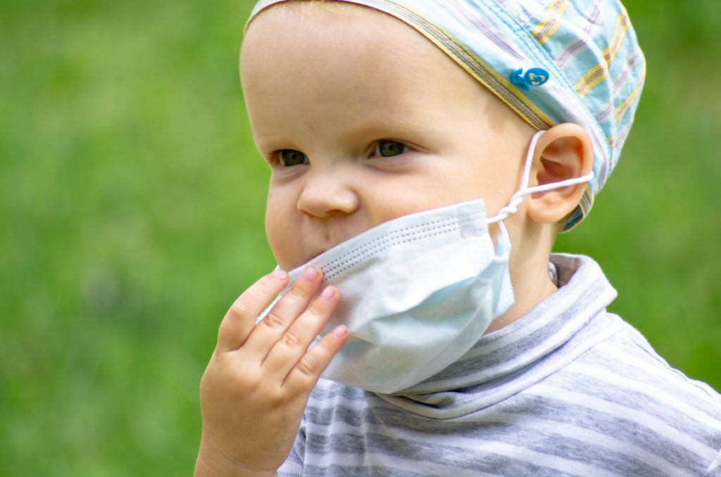 child with a mask