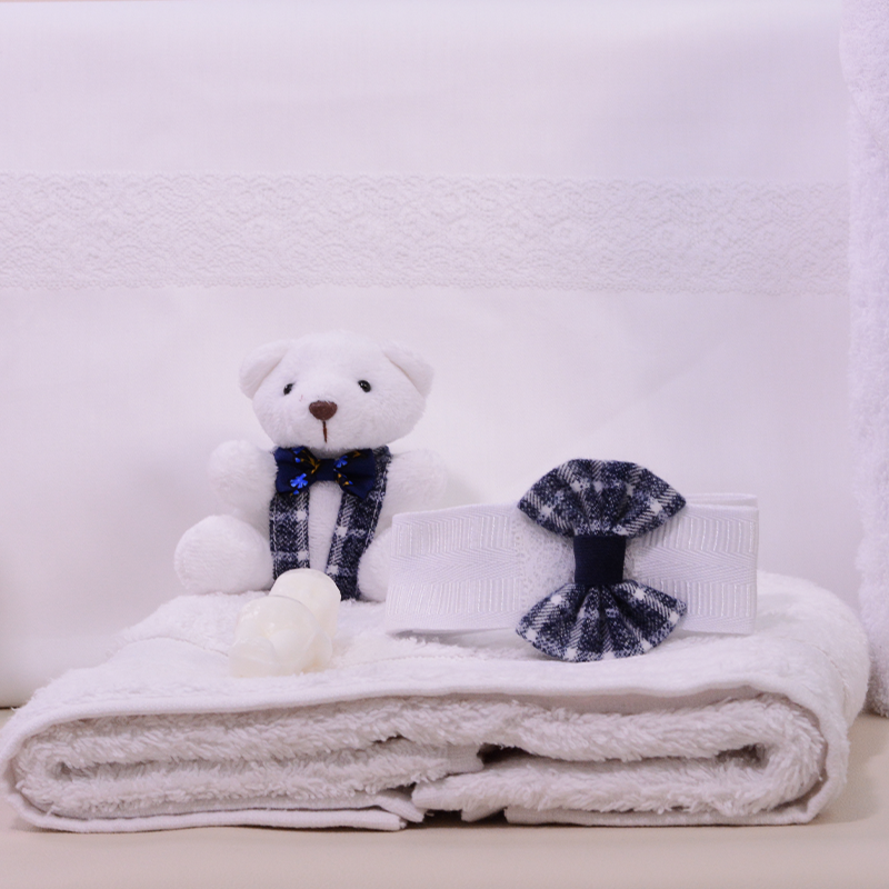 teddy bear christening kit for boys with a bow