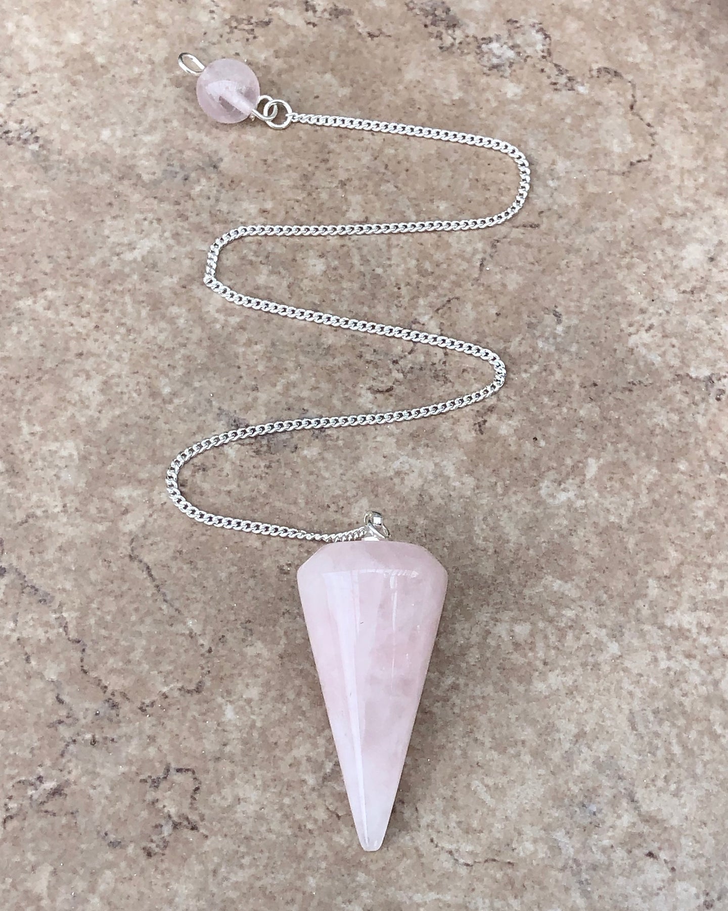 crystal rose quartz pendulum