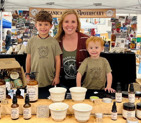 BBA Partner Chrys with her boys at a community event speaking about BBA's sustainabilty initiatives.