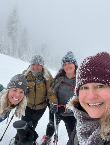 Picture of founder Dena snowshoeing with her hiking buddies.