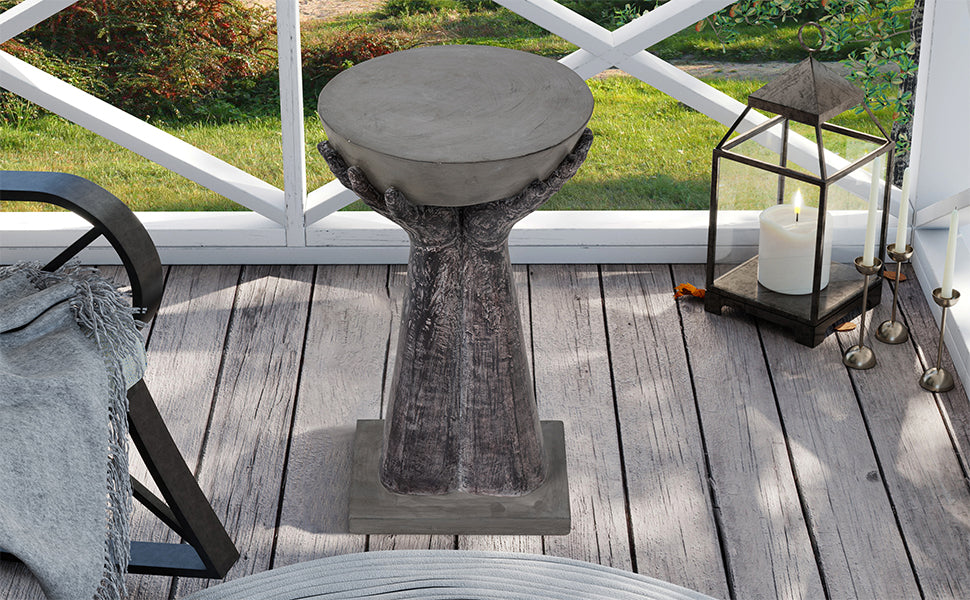 Hand Shape Side Table placed in patio