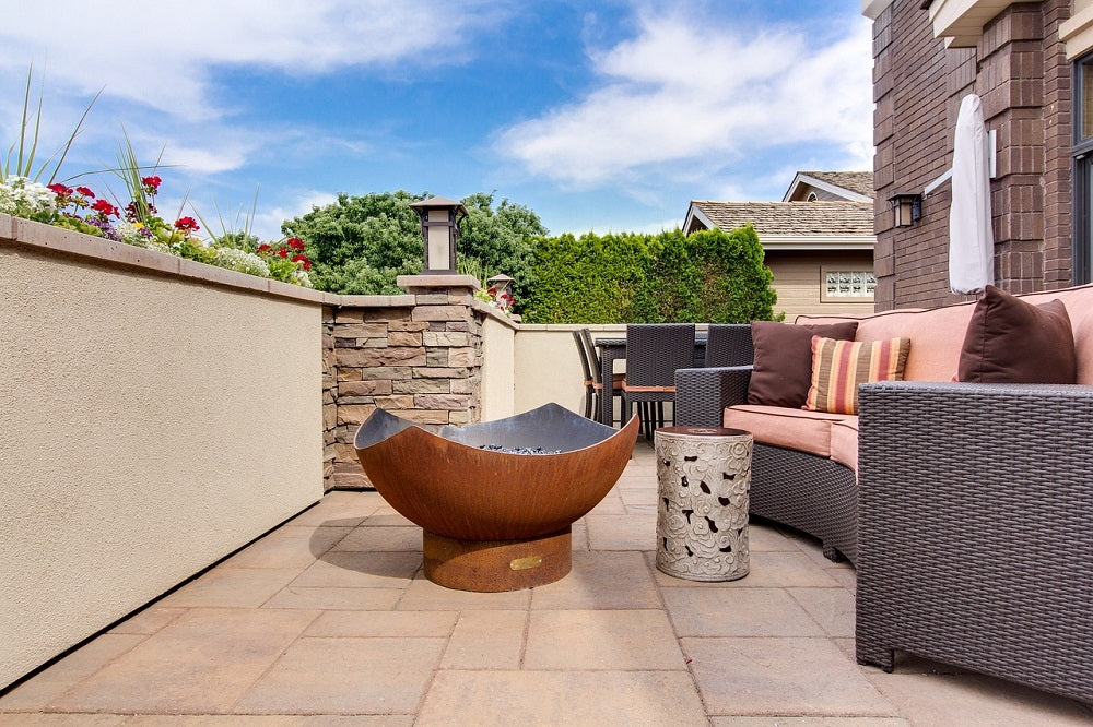 On a sunny day, the courtyard was furnished with some outdoor furniture