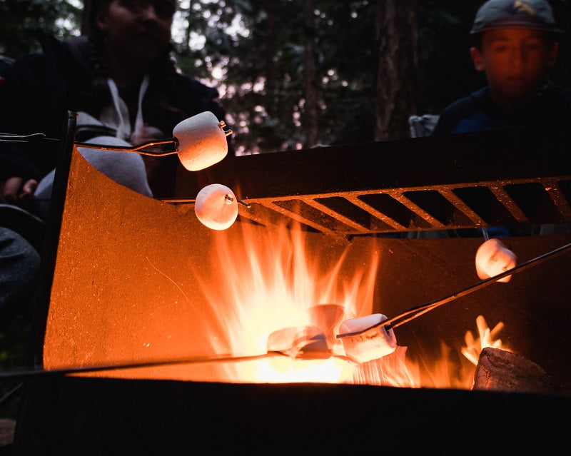 Roast marshmallows outdoors on the fire pit with friends