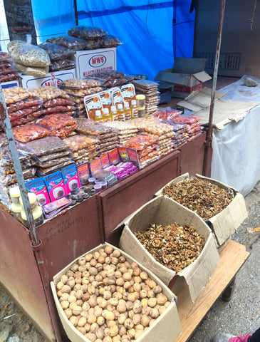 Dharamshala street vendor selling walnuts and apricots