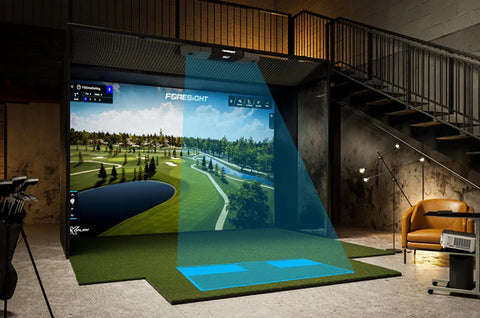The Falcon set up lighting up the golf mat with the hitting space in a golf simulator studio