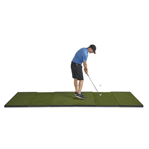 Image of a golfer getting ready to hit on a Fiberbuilt Player Preferred golf mat