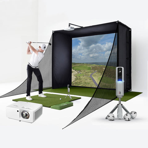 A golfer swinging in a PlayBetter SimStudio on a hitting mat with a Rapsodo MLM2PRO unit and projector in the foreground of the image