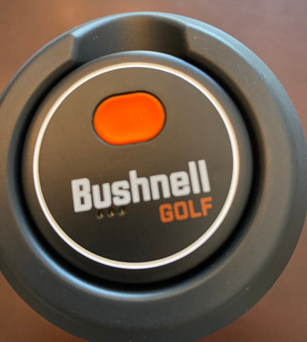 Top view of the Bushnell Wingman 2 with the remote in its magnetic cradle