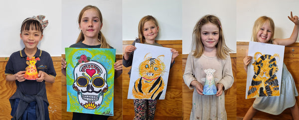 Happy young Artists proud of their work