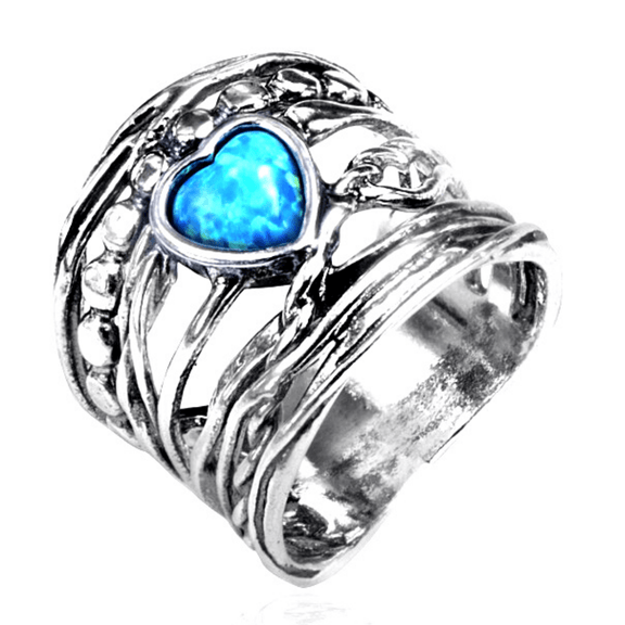 Silver ring with an heart opal
