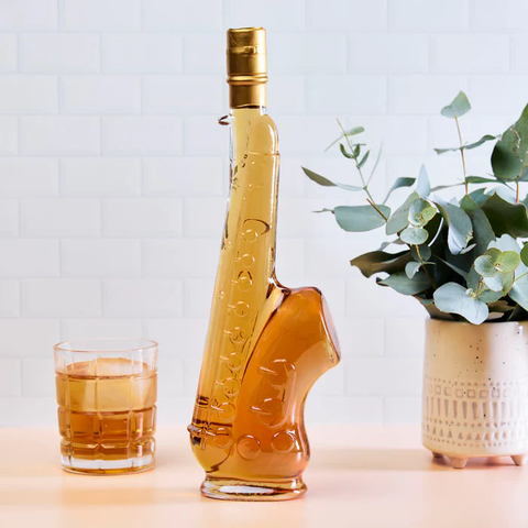 Saxophone Bottle filled with Butterscotch Liqueur