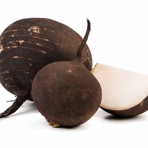 black radishes on a table