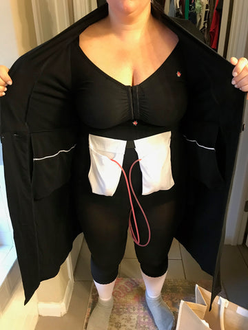 Brobe customer wearing her surgery recovery robe with the Brobe post op drain belt