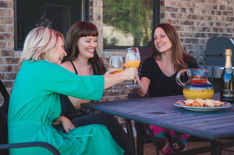 women at table together