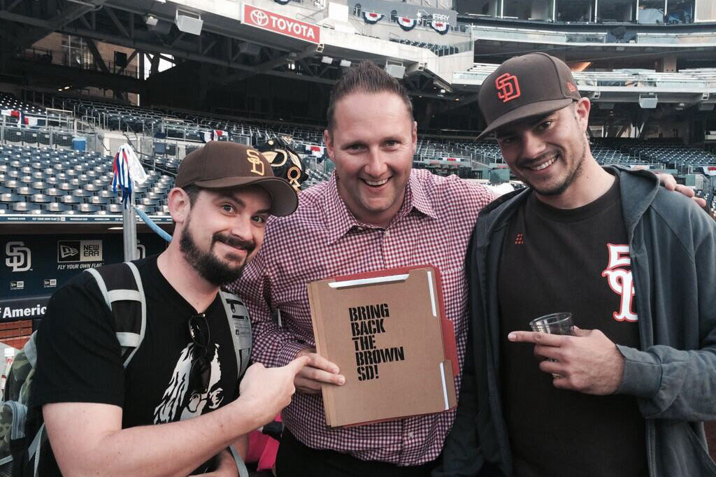 Handing 'Bring Back The Brown' Signatures to Padres CMO Wayne Partello