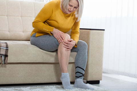 woman suffering from joint pain due to her gluten sensitivity
