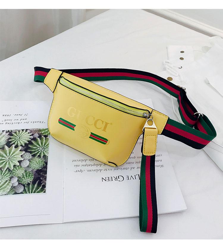 gucci fanny pack yellow and black