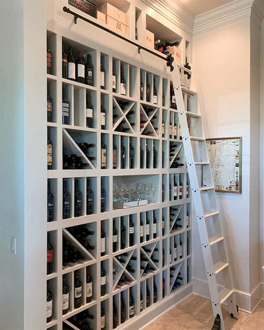 Wine rack with a library ladder from the library ladder company