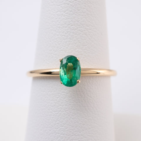 oval emerald solitaire ring