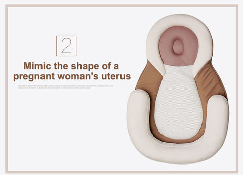 portable baby bed mimics the shape of pregnant woman uterus