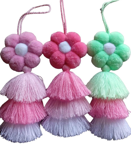 Colorful, floral Mother's Day poms! The perfect addition to any Squeeze De Citron bag and a great Mother's Day gift!