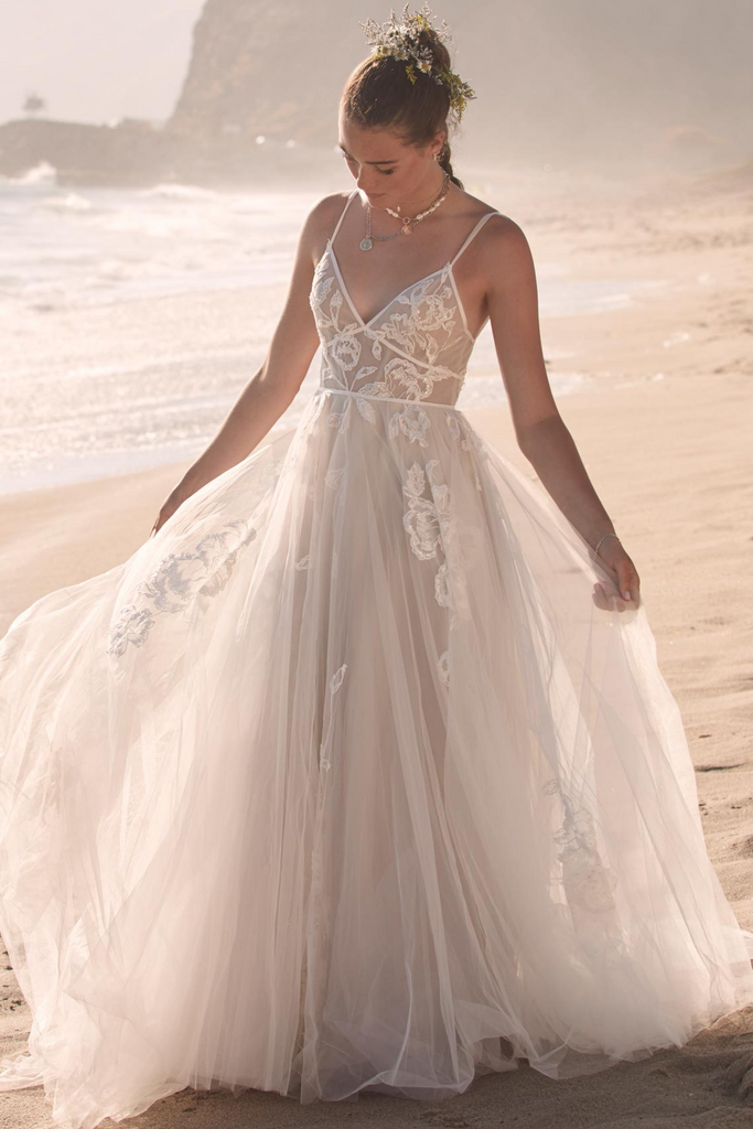 Model wearing Willowby by Watters Kendrew wedding dress