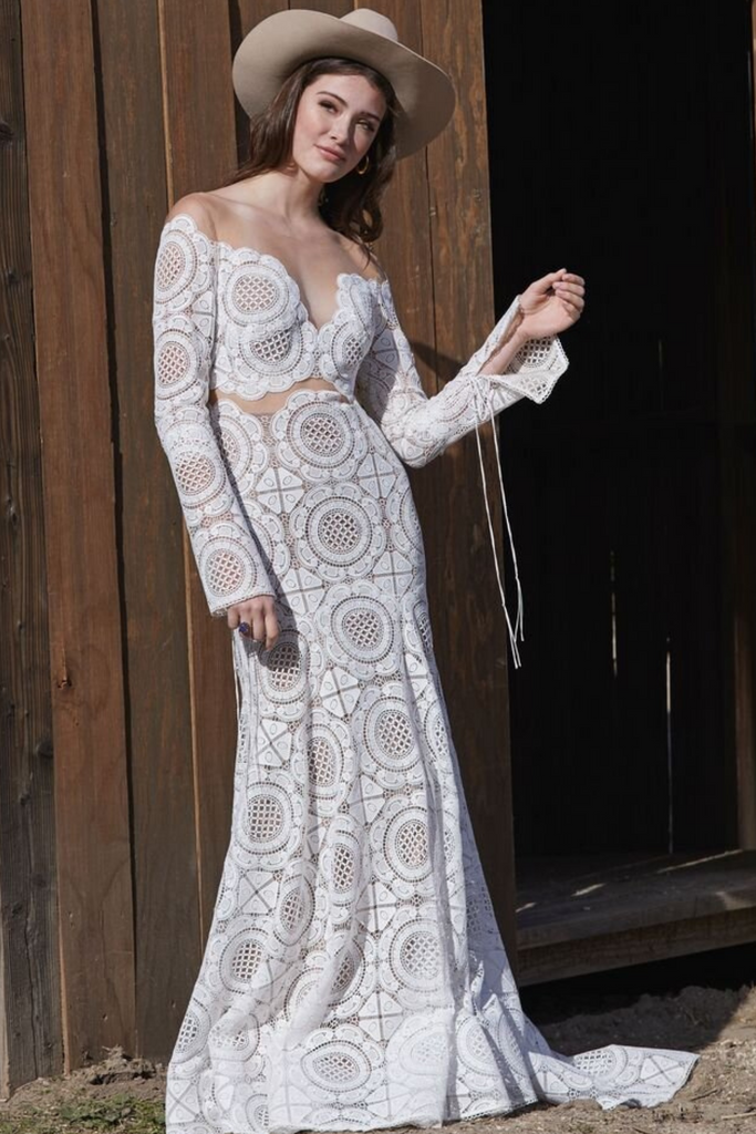 Model wearing Willowby by Watters Westley fitted, bohemian wedding dress.