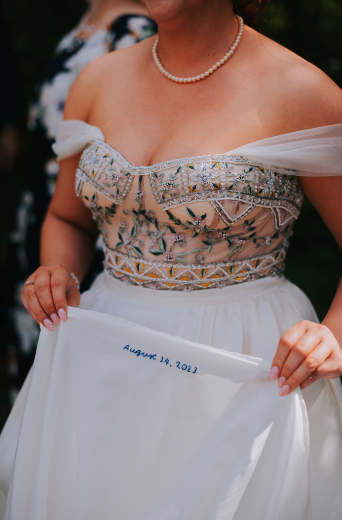 Bridal gown with wedding date printed on to the skirt.