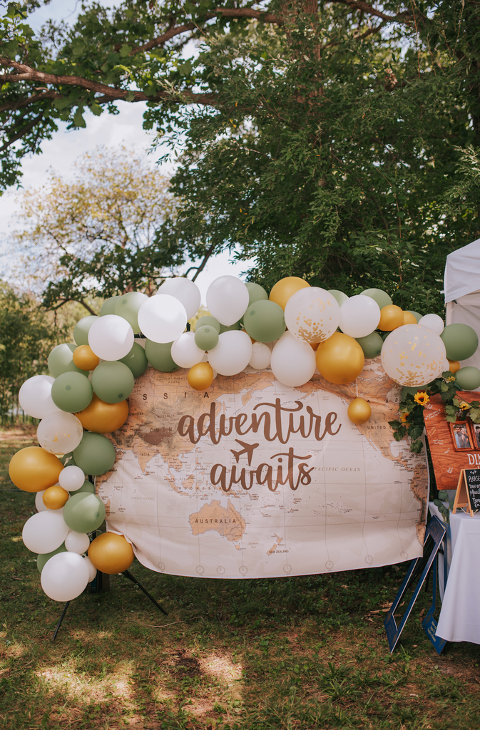 Wedding reception details: balloon banner with sign.