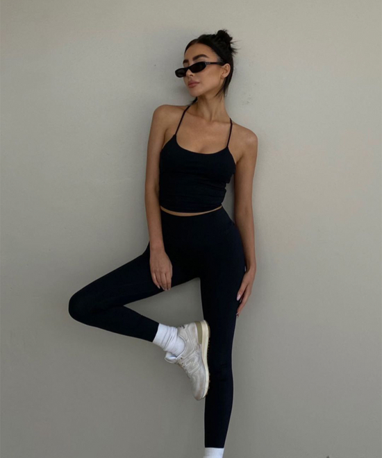 Model in CSB black athleisure 