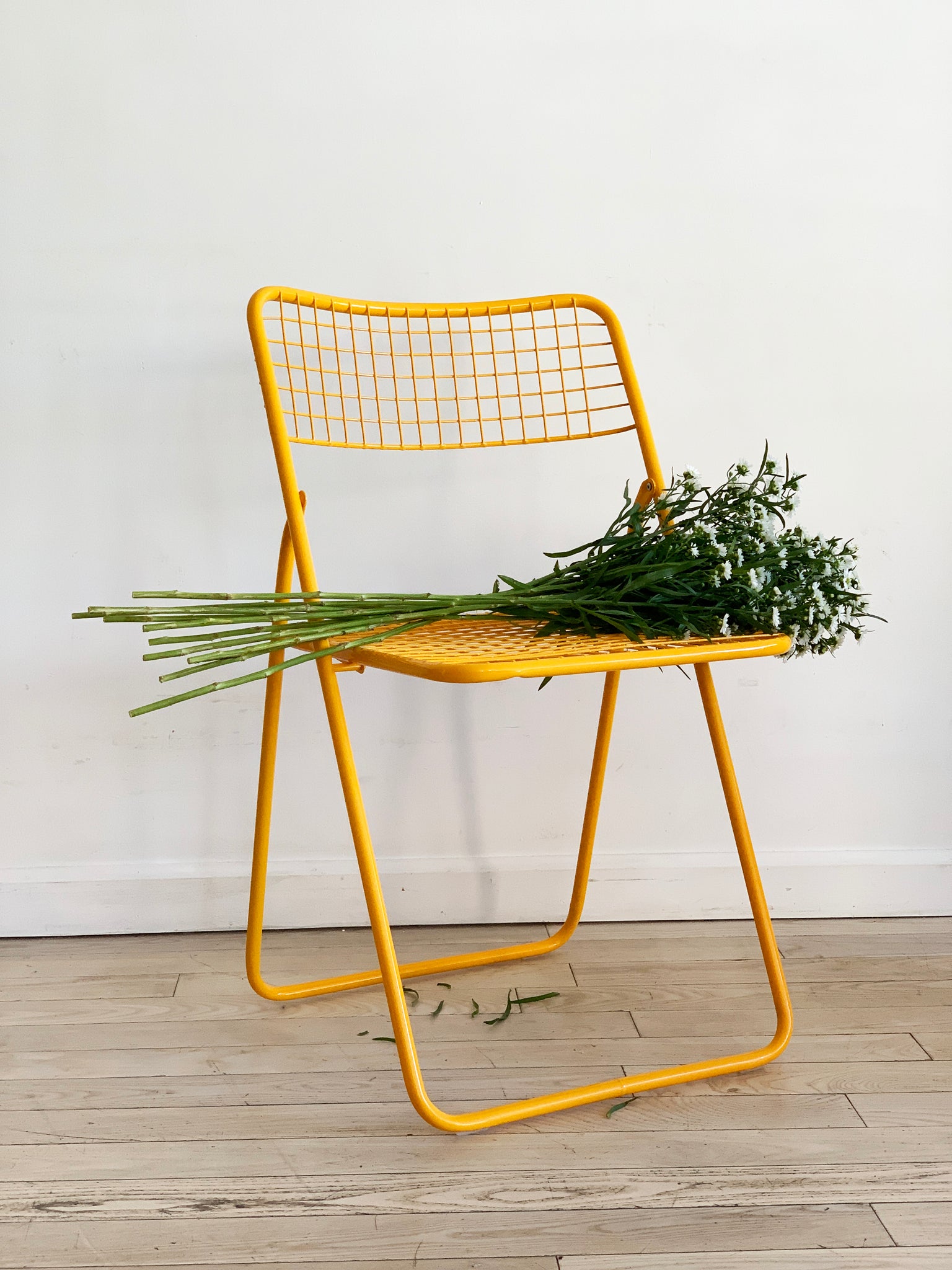 yellow metal grid folding chairniels gammelgaard for